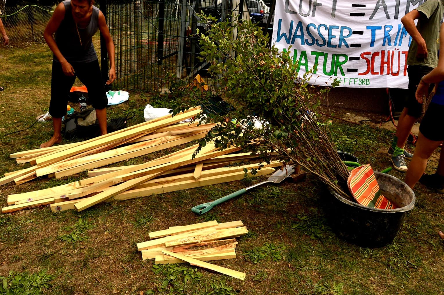 Bike tour with tree planting action in cooperation with XR and FFF in August 2019 in Potsdam, Brandenburg and Krielow.